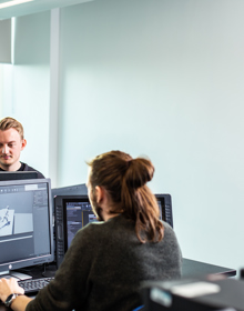 two students working on 3d modelling on campus
