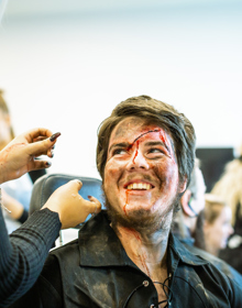 University Centre Leeds student doing make up on another student