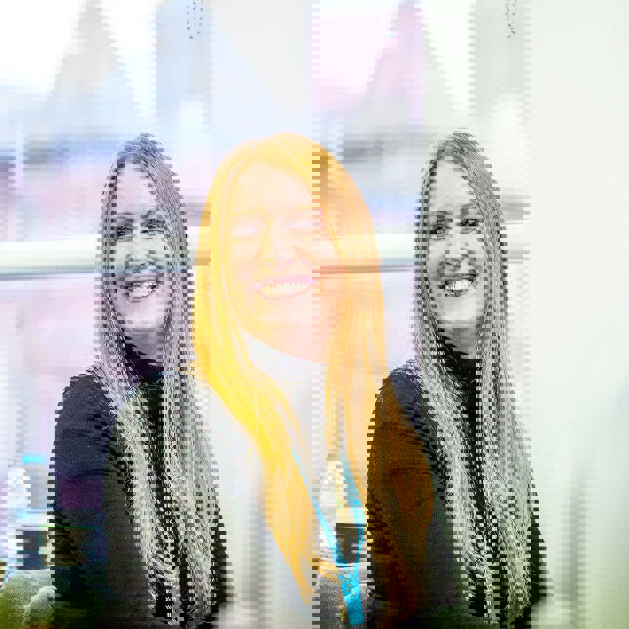 Person smiling of to the left