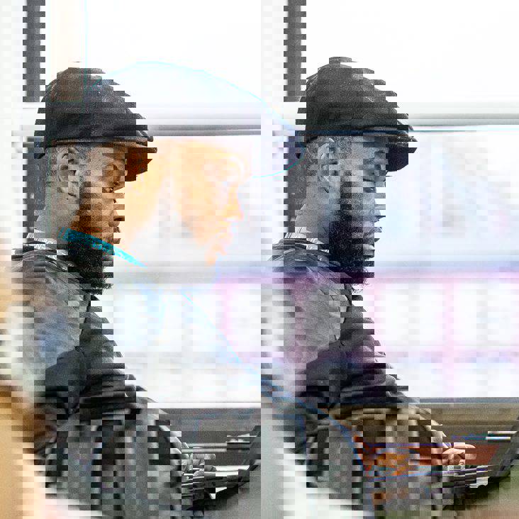 student sat at a desk with a laptop