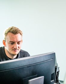 student looking at a monitor