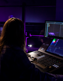 production student in front of mixing screen